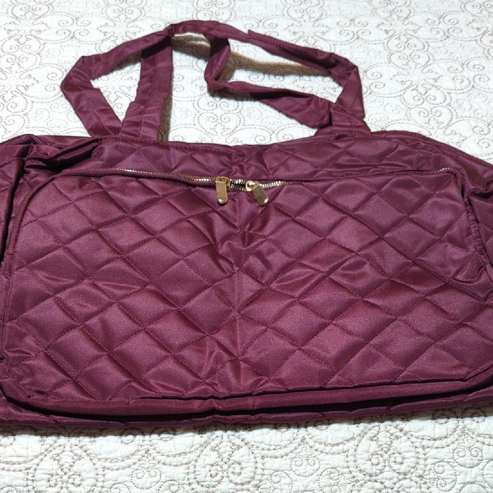Red Quilted Travel Bag with Diamond Pattern